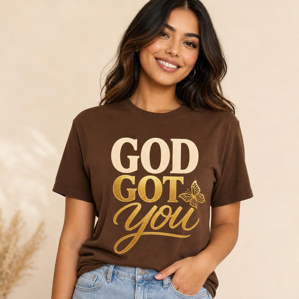 GOD GOT YOU! design shown on brown apparel